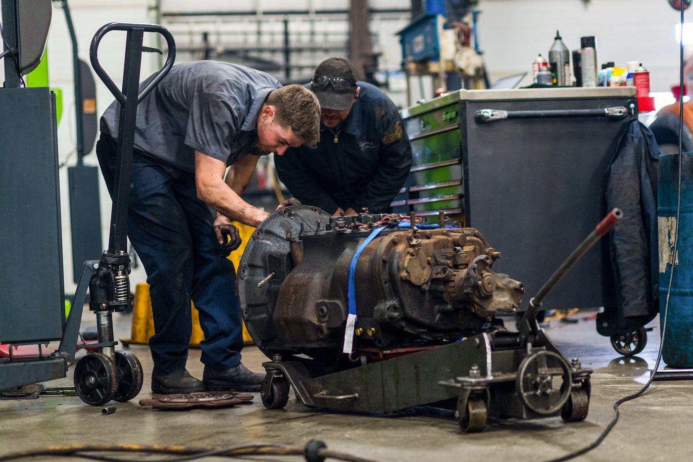 Mechanic hands using spanners during equipment service