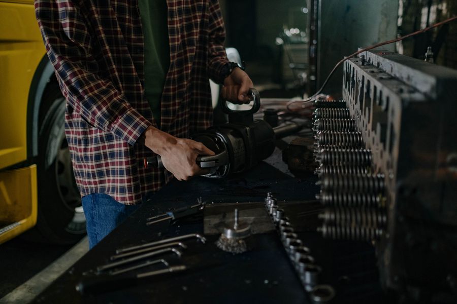 Mechanic working with repair tools