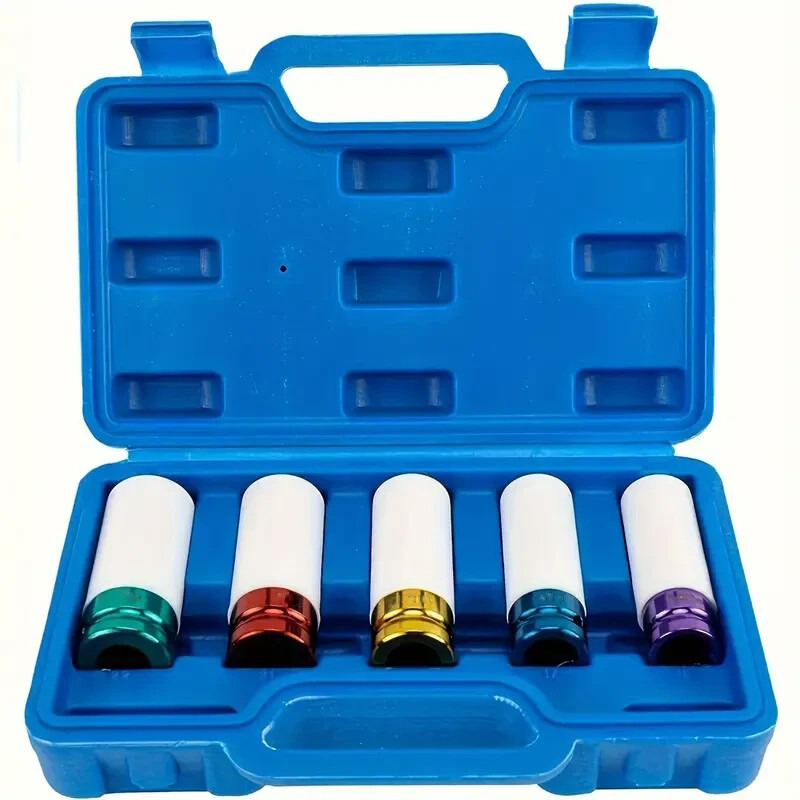 Mechanic using wheel impact socket