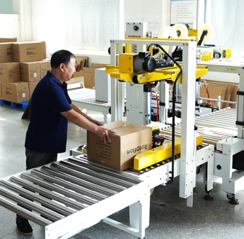Foreverseal® Adds a New Automatic Carton Strapping Machine