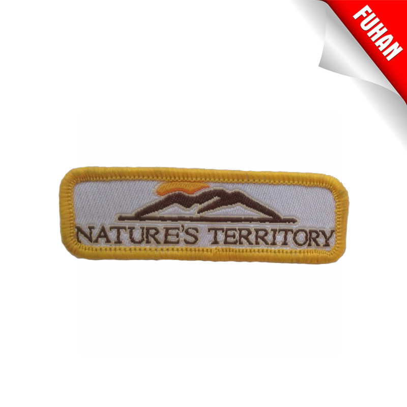 Iron on merrowed badge woven patch