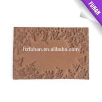 Wholesale cheap custom embossed leather patch/jeans leather patch