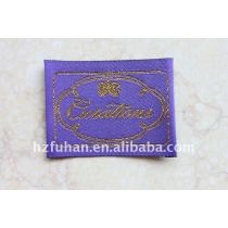 Plane density woven labels with gold logo
