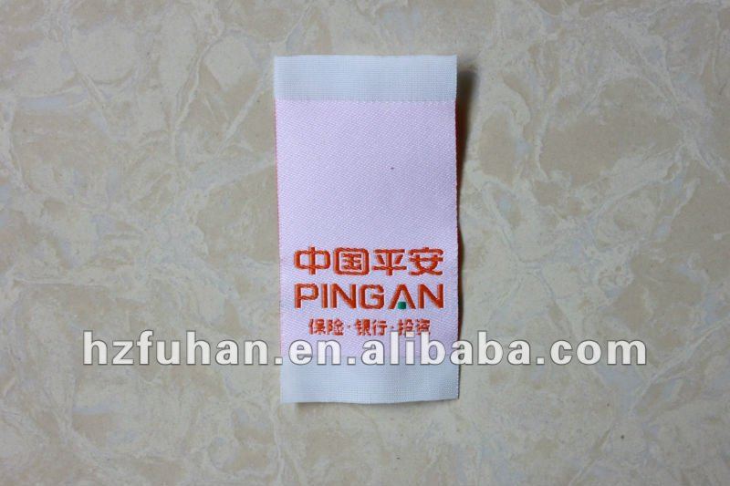 pink own label brand woven label