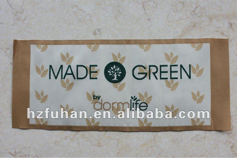 embroidered sheer fabric woven label