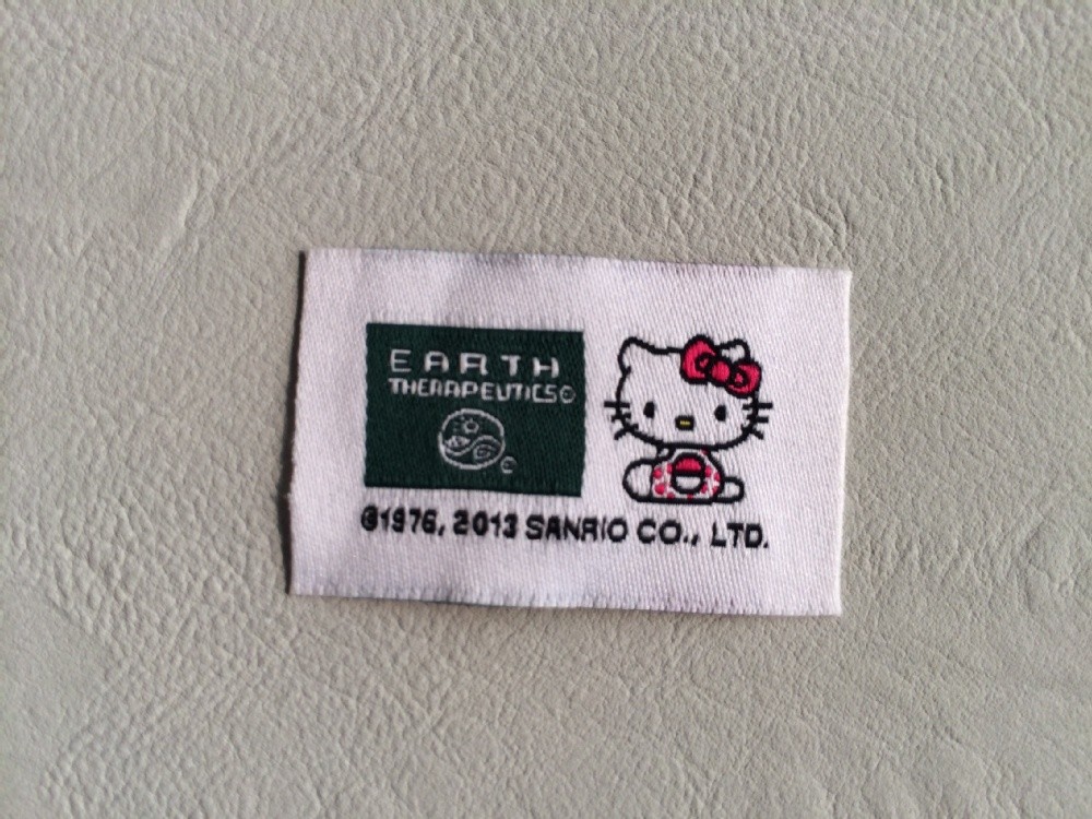 Customized heat adhesive woven label
