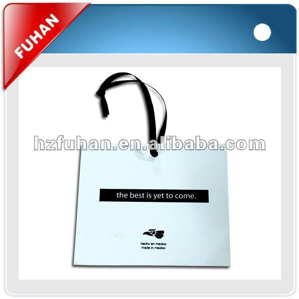 garment colorful hangtag made of white cardboard