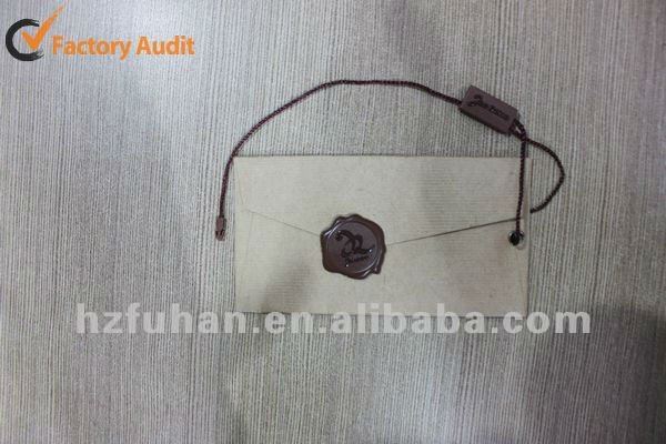 Coated paper hang tag for fashionable dress