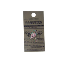 Different shaped brown hang tags with string