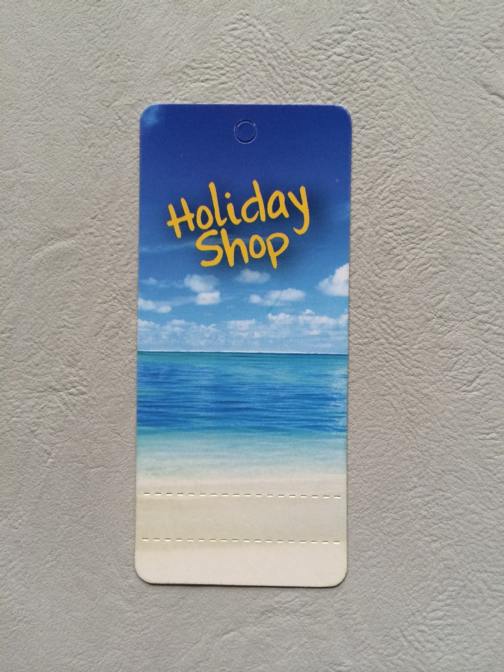 Water resistant UV-coating hang tag