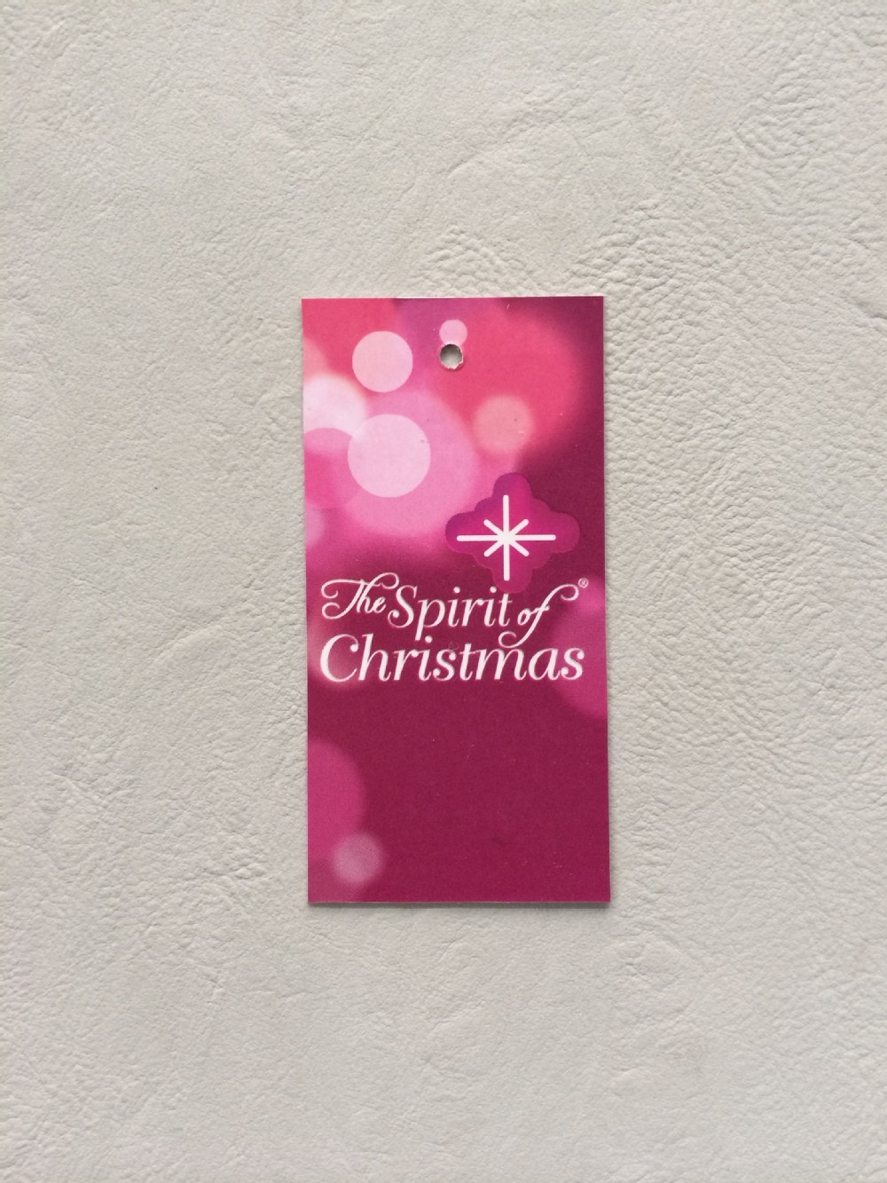 Garment hang tag and free design with parchment paper