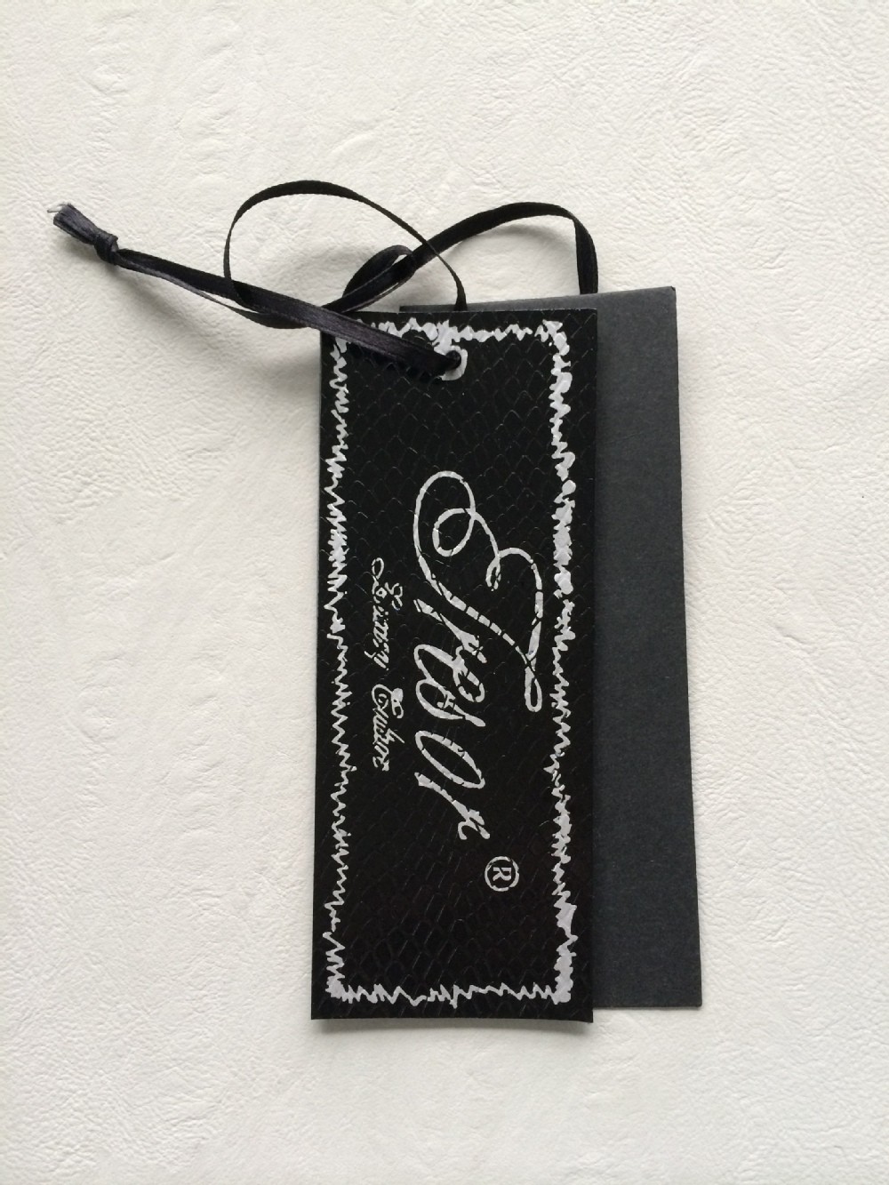 Garment usd embossed and spot UV hang tag size