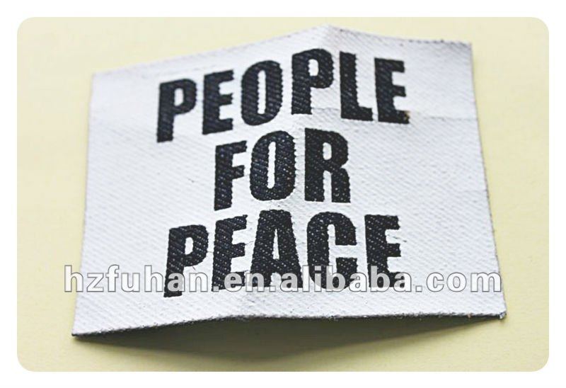white printed label with the letter people for peace