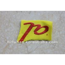 yellow bottom and red letter printed label for garment