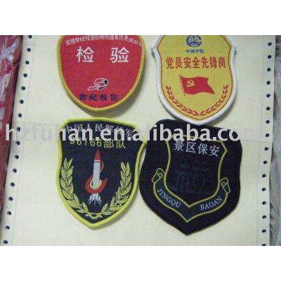 Embroidered patch and badges