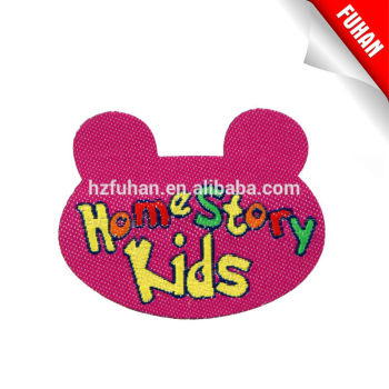 2014 hot sale eco-friendly feature embroidery patch with hot cut for garment/bag/hat