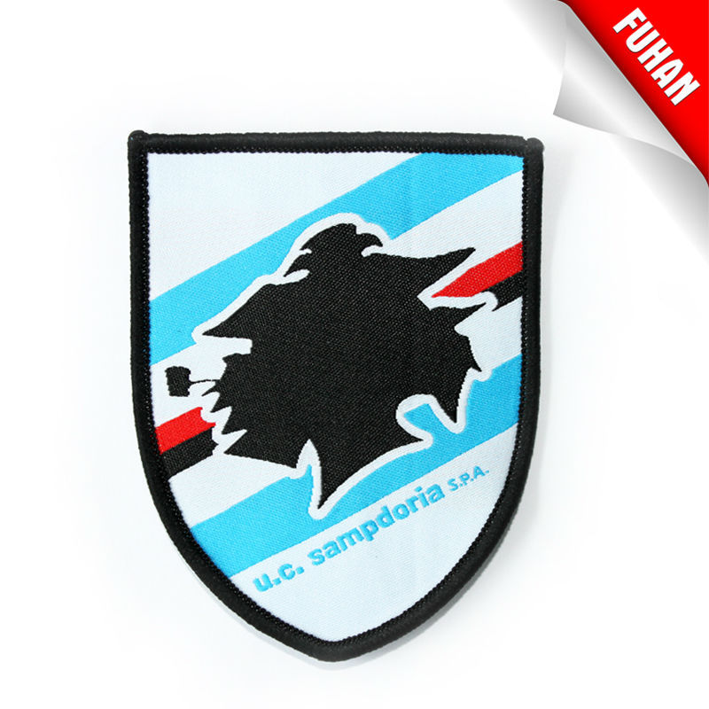 Shoulder woven patch in apparel with embroidery patch