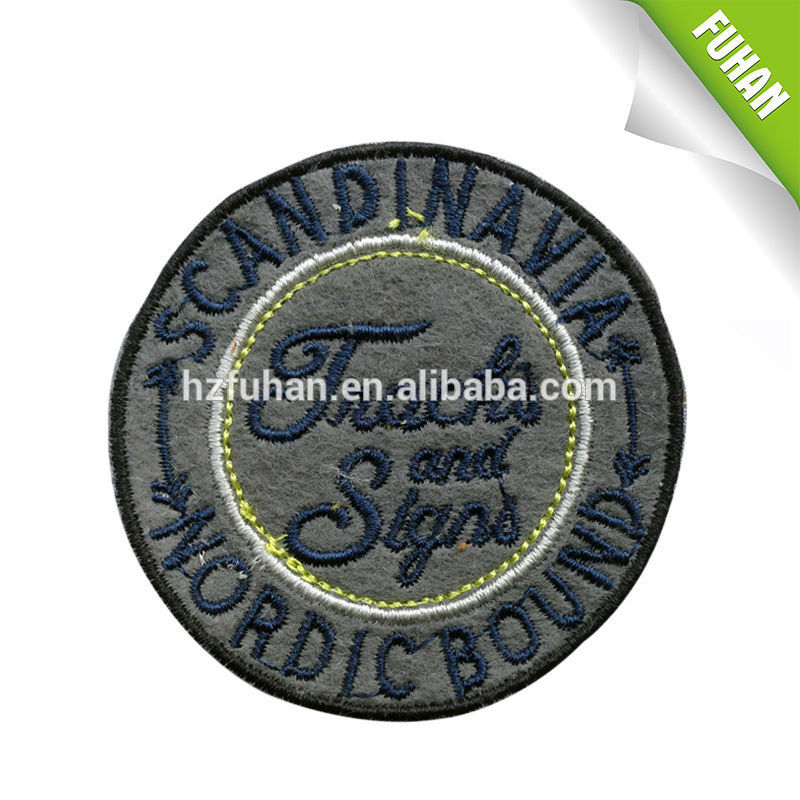 2014 fashionable design customized round shape lockrand embroidery patch for garment