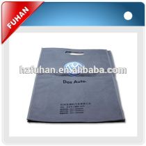 2014 customized non woven fabric material punch style shopping bag for garment/shoes/bags/toys