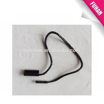 Plastic seal tag with string for dark color clothing