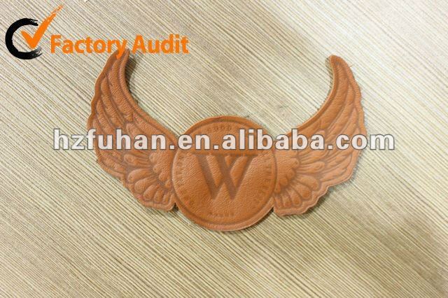 2012 customed shape embossed jeans leather label