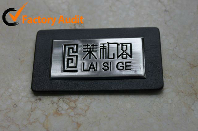 Customized machine embossed leather label