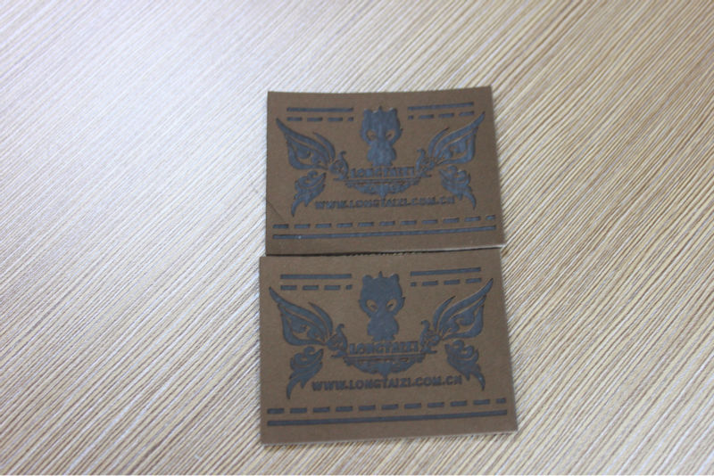 2013 fashion apparel leather patch label with metal and revet ,jeans and clothing label