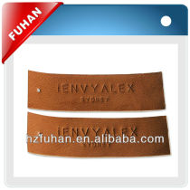 2013 fashion apparel leather patch label with metal and revet ,jeans and clothing label