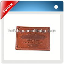 Customed hot popular fashion leather labels for jeans