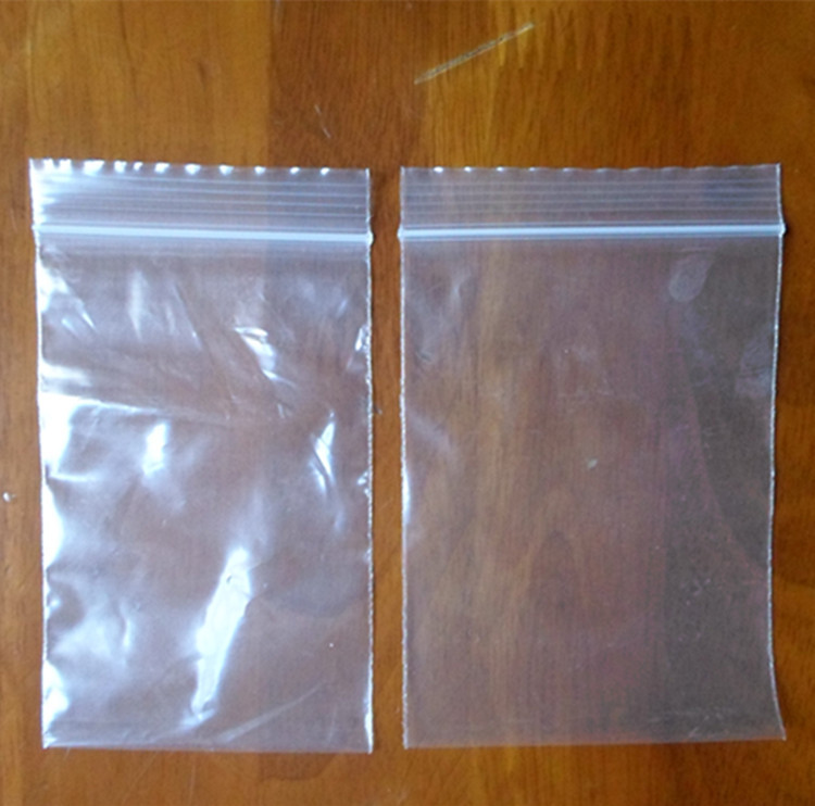 Large pe bag with adhesive strip