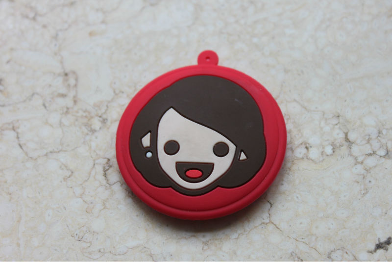 Red rubber badge for bags