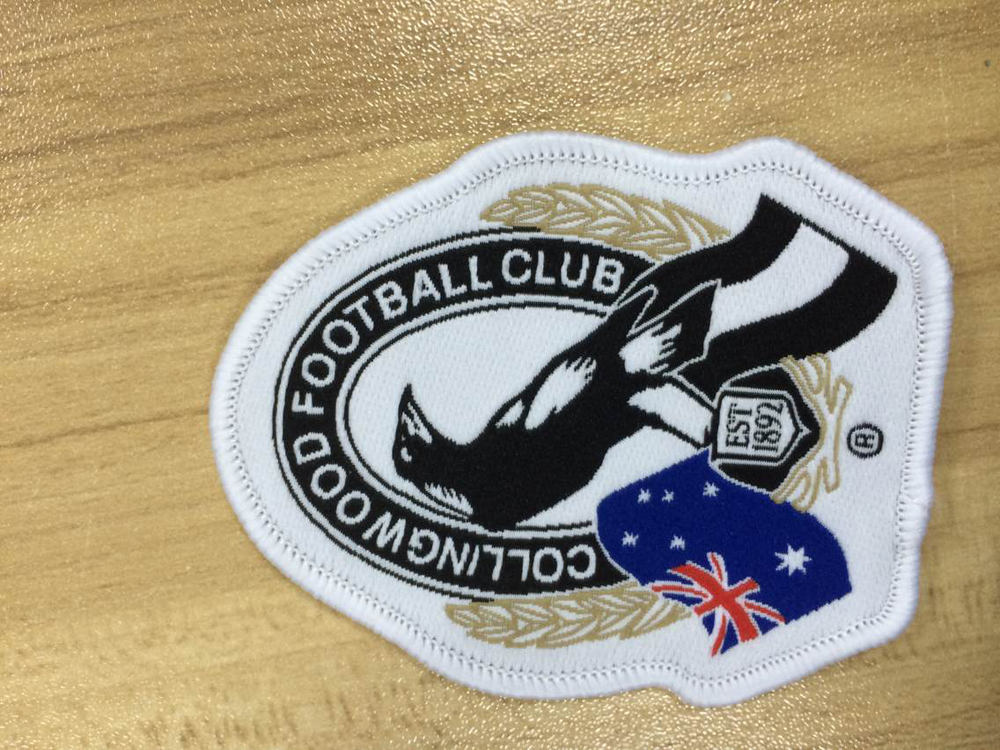 Exquisite Merrowed Border irregular shape woven patch with animal logo for clothing