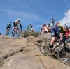 Lance Armstrong and George Hincapie have some fun in the desert