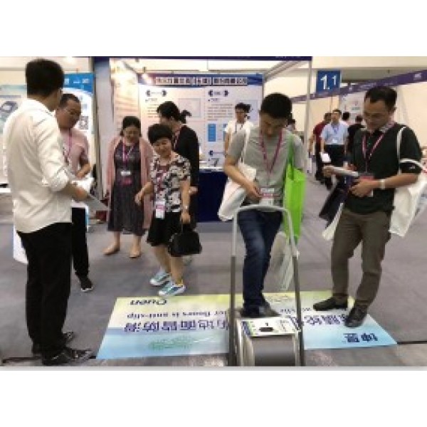 QUEN Automatic Intelligent Shoe Wrapping Machine was showed at CHINA HIGHER EDUCATION EXPO