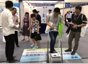 QUEN Automatic Intelligent Shoe Wrapping Machine was showed at CHINA HIGHER EDUCATION EXPO