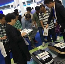 Quen were at China Hi-Tech Fair for Automatic Shoe Cover Machine