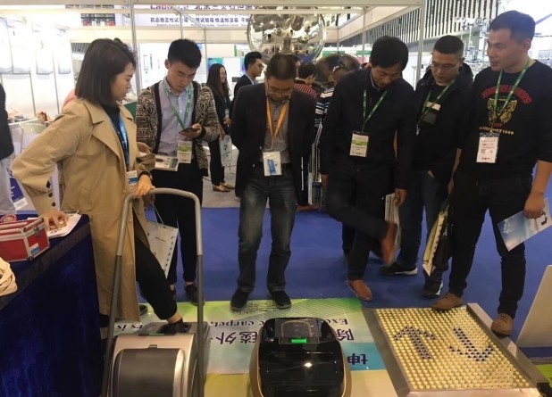 Quen attended the 81th API China Expo for Automatic shoe cover machine