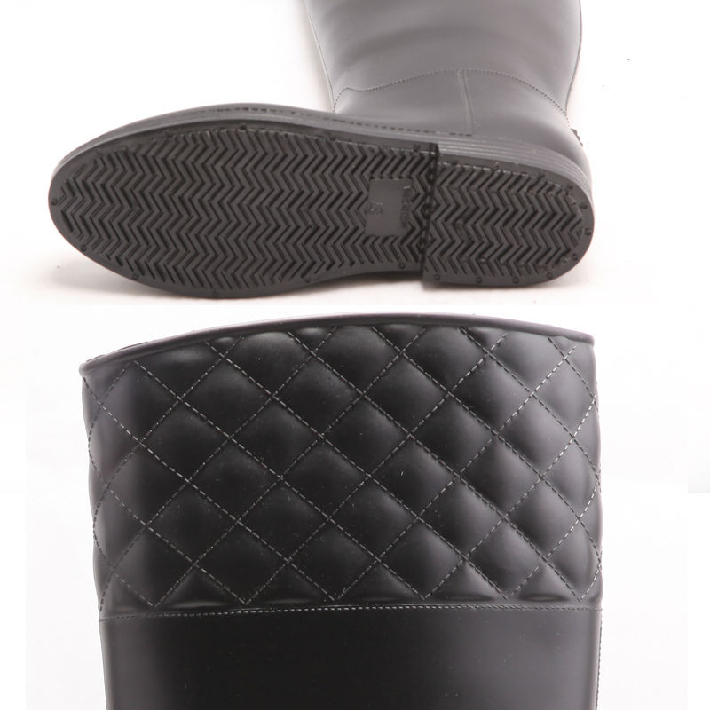 Long black rain boots with zipper