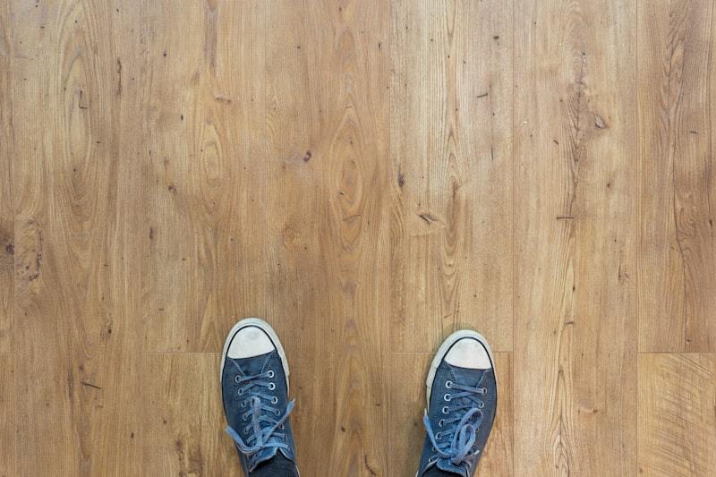 Modern kitchen with wood-look vinyl plank flooring showing realistic grain texture