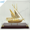Beautiful Golden Model Sailboat Sails