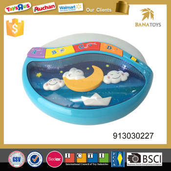 Plastic electric baby rocking and musical toy with light and sound
