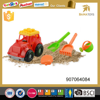 Beach plastic toy car with garden spade