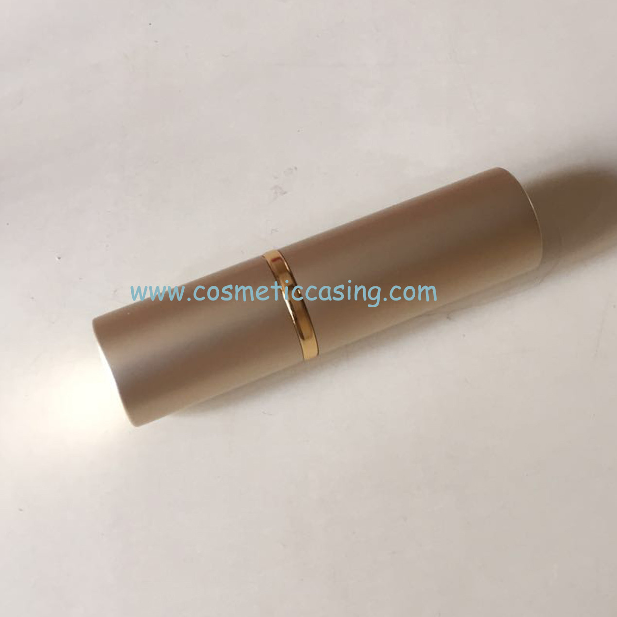 golden lipstick tube, lipstick container, lipstick case