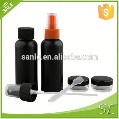 Empty cosmetic bottles and jars in black