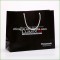 China wholesale custom made pp plastic black shopping gift bag