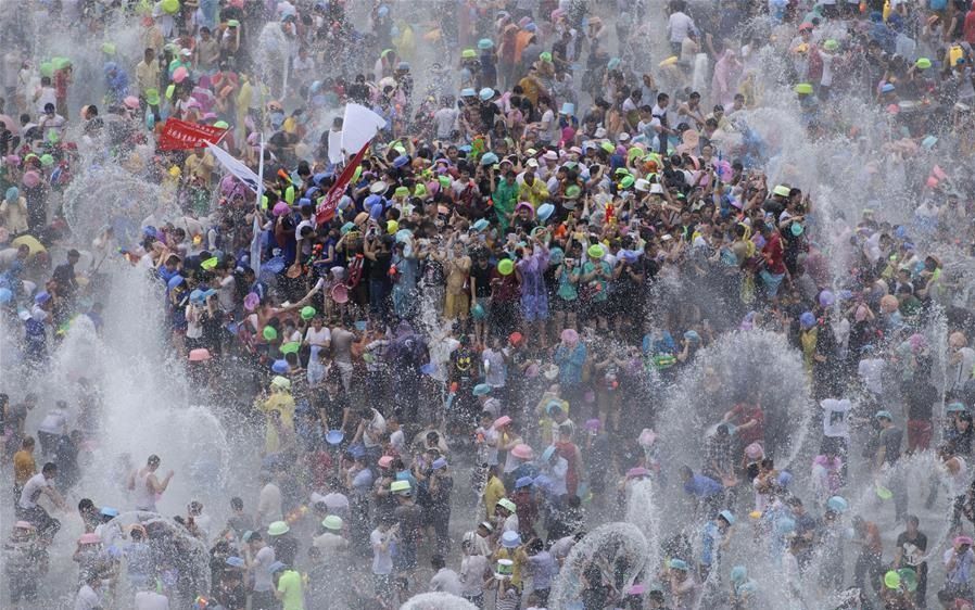 Water-sprinkling festival marked in SW China