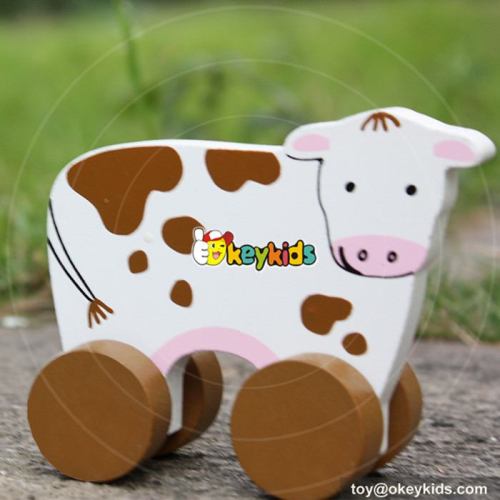 Best design baby cartoon cow toys wooden toy vehicles W04A322