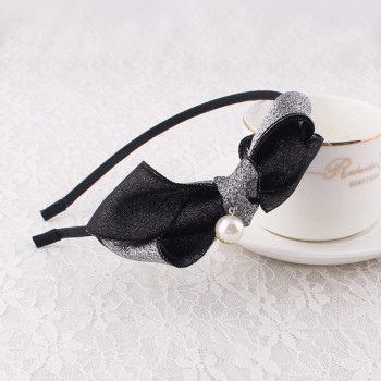Black bow hair band piece with pearl