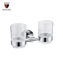 Stainless steel double toothbrush holder set in bathroom