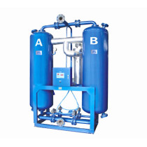 Heated regenerative desiccant compressed air dryer